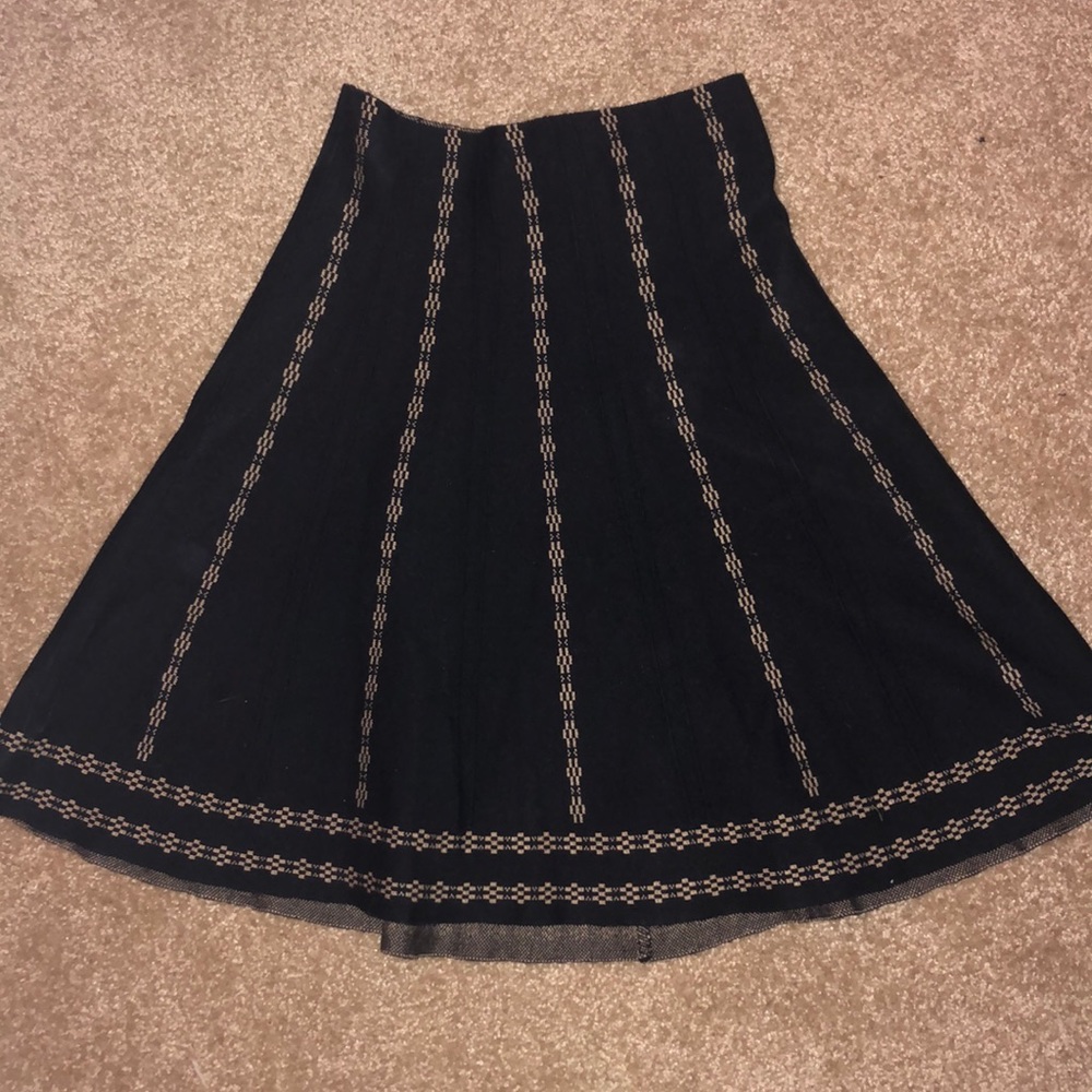 Knee length black skirt
